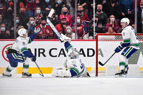 MONTREAL, QC – NOVEMBER 29: Goaltender Thatcher Demko #35 of the Vancouver Canucks gets the stick up to make a save. (Photo by Minas Panagiotakis/Getty Images)