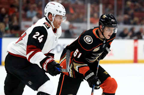 ANAHEIM, CA – SEPTEMBER 24: Hudson Fasching #24 of the Arizona Coyotes defends against Troy Terry #61 of the Anaheim Ducks during the first period of an NHL preseason game at Honda Center on September 24, 2018, in Anaheim, California. (Photo by Sean M. Haffey/Getty Images)