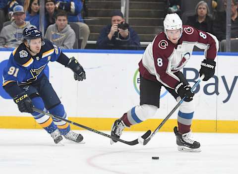 ST. LOUIS, MO. – OCTOBER 21: St. Louis Blues rightwing Vladimir Tarasenko (91) reaches in to get the puck from Colorado Avalanche defenseman Cale Maker (8) during a NHL game between the Colorado Avalanche and the St. Louis Blues on October 21, 2019, at Enterprise Center, St. Louis, MO. (Photo by Keith Gillett/Icon Sportswire via Getty Images)