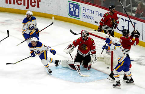 Mar 28, 2022; Chicago, Illinois, USA; Buffalo Sabres players celebrate their game winning goal against the Chicago Blackhawks during the third period at United Center. Mandatory Credit: David Banks-USA TODAY Sports