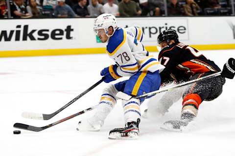 ANAHEIM, CALIFORNIA – OCTOBER 28: Jacob Bryson #78 of the Buffalo Sabres controls the puck past the defense of Hampus Lindholm #47 of the Anaheim Ducks during the second period of a game at Honda Center on October 28, 2021 in Anaheim, California. (Photo by Sean M. Haffey/Getty Images)