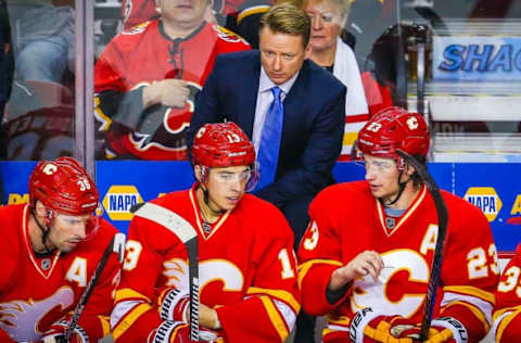 Oct 14, 2016; Calgary, Alberta, CAN; Calgary Flames head coach Glen Gulutzan on his bench against Edmonton Oilers during the third period at Scotiabank Saddledome. Edmonton Oilers won 5-3. Mandatory Credit: Sergei Belski-USA TODAY Sports