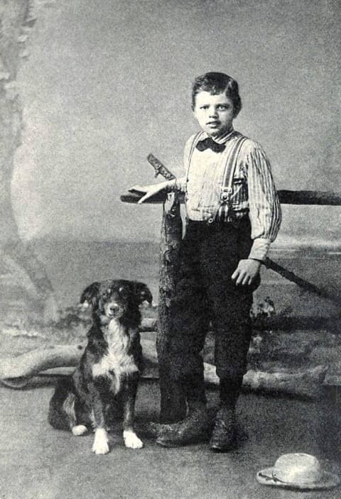 Jack London, age 9, with his dog Rollo in 1885.