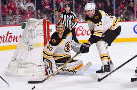 MONTREAL, QC – JANUARY 13: Boston Bruins Defenceman Zdeno Chara (33) tries to push away the puck from Boston Bruins Goalie Tuukka Rask (40) during the Boston Bruins versus the Montreal Canadiens game on January 13, 2018, at Bell Centre in Montreal, QC (Photo by David Kirouac/Icon Sportswire via Getty Images)