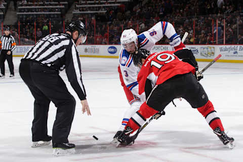 Derick Brassard #19 of the Ottawa Senators take a face-off against Mika Zibanejad #93 of the New York Rangers (Photo by Jana Chytilova/Freestyle Photography/Getty Images)