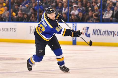 Jan 4, 2016; St. Louis, MO, USA; St. Louis Blues defenseman Kevin Shattenkirk (22) shoots the puck in the game against the Ottawa Senators during the second period at Scottrade Center. Mandatory Credit: Jasen Vinlove-USA TODAY Sports