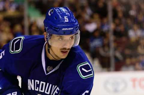 Nov 15, 2016; Vancouver, British Columbia, CAN; Vancouver Canucks defenseman Luca Sbisa (5) skates against the New York Rangers during the second period at Rogers Arena. The New York Rangers won 7-2. Mandatory Credit: Anne-Marie Sorvin-USA TODAY Sports