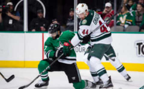 Jan 14, 2017; Dallas, TX, USA; Dallas Stars defenseman Johnny Oduya (47) and Minnesota Wild center Tyler Graovac (44) fight for the puck during the second period at the American Airlines Center. Mandatory Credit: Jerome Miron-USA TODAY Sports