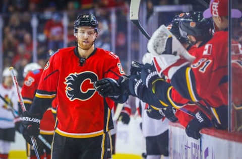 Oct 28, 2016; Calgary, Alberta, CAN; Calgary Flames defenseman Dougie Hamilton (27) celebrates his goal with teammates against Ottawa Senators during the first period at Scotiabank Saddledome. Mandatory Credit: Sergei Belski-USA TODAY Sports