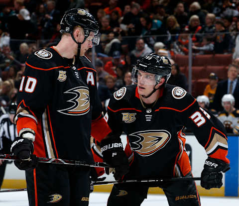 ANAHEIM, CA – FEBRUARY 15: Jakob Silfverberg #33 of the Anaheim Ducks chats with Corey Perry #10 before a face-off during the game against the Boston Bruins on February 15, 2019 at Honda Center in Anaheim, California. (Photo by Debora Robinson/NHLI via Getty Images)