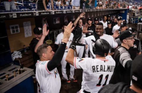 MIAMI, FL – JUNE 11: J.T. Realmuto #11 of the Miami Marlins celebrates after hitting a two run home run during the game against the San Francisco Giants at Marlins Park on June 11, 2018 in Miami, Florida. (Photo by Rob Foldy/Miami Marlins via Getty Images)