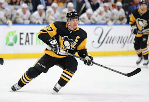 Mar 5, 2020; Buffalo, New York, USA; Pittsburgh Penguins center Sidney Crosby (87) looks for the puck during the first period against the Buffalo Sabres at KeyBank Center. Mandatory Credit: Timothy T. Ludwig-USA TODAY Sports