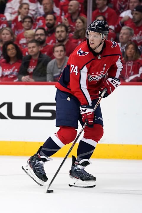 WASHINGTON, DC – APRIL 11: John Carlson #74 of the Washington Capitals skates with the puck in the second period against the Carolina Hurricanes in Game One of the Eastern Conference First Round during the 2019 NHL Stanley Cup Playoffs at Capital One Arena on April 11, 2019 in Washington, DC. (Photo by Patrick McDermott/NHLI via Getty Images)