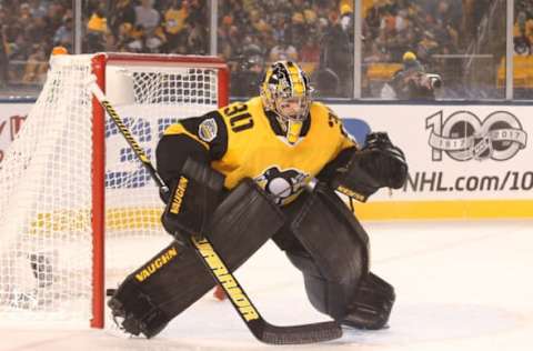 Feb 25, 2017; Pittsburgh, PA, USA; Pittsburgh Penguins goalie Matt Murray (30) defends the net against the Philadelphia Flyers during the first period in a Stadium Series hockey game at Heinz Field. The Penguins won 4-2. Mandatory Credit: Charles LeClaire-USA TODAY Sports