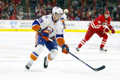 Feb 13, 2016; Raleigh, NC, USA; New York Islanders forward Brock Nelson (29) skates with the puck against the Carolina Hurricanes at PNC Arena. The Carolina Hurricanes defeated the New York Islanders 6-3. Mandatory Credit: James Guillory-USA TODAY Sports