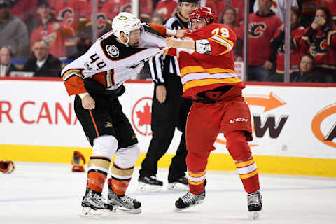 Apr 2, 2017; Calgary, Alberta, CAN; Anaheim Ducks center Nate Thompson (44) fights with Calgary Flames left wing Michael Ferland (79) during the second period at Scotiabank Saddledome. Mandatory Credit: Candice Ward-USA TODAY Sports