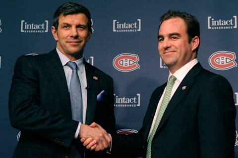 BROSSARD, CANADA – MAY 2: Montreal Canadiens General Manager Marc Bergevin and team owner Geoff Molson shake hands after a press conference introducing Bergevin as the new General Manager of the team at the Bell SportsPlex on May 2, 2012 in Brossard, Quebec, Canada. (Photo by Richard Wolowicz/Getty Images)