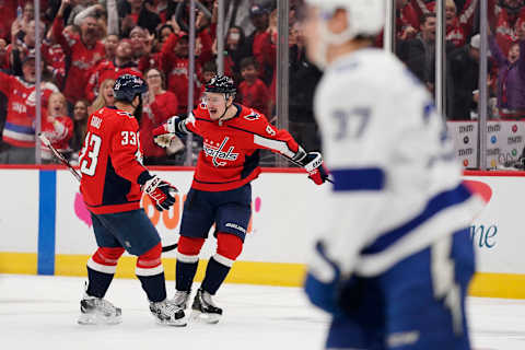 WASHINGTON, DC – DECEMBER 21: Dmitry Orlov #9 of the Washington Capitals celebrates with Radko Gudas #33 after scoring a goal against the Tampa Bay Lightning in the third period at Capital One Arena on December 21, 2019 in Washington, DC. (Photo by Patrick McDermott/NHLI via Getty Images)