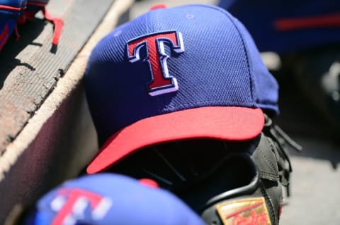 Mar 14, 2015; Peoria, AZ, USA; A Texas Rangers cap sits in the dugout against the San Diego Padres at Peoria Sports Complex. Mandatory Credit: Joe Camporeale-USA TODAY Sports