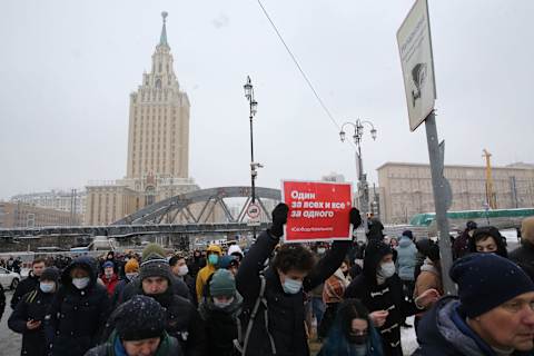 MOSCOW, RUSSIA – JANUARY 31: (RUSSIA OUT) A man holds a poster demanding freedom for Navalny during an unauthorized protest rally against the jailing of opposition leader Alexei Navalny, on January 31,2021, in Central Moscow, Russia. Police on Sunday detained more than 4100 protesters demanding the release of Vladimir Putin’s critic Alexei Navalny. (Photo by Mikhail Svetlov/Getty Images)