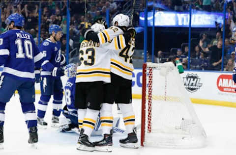 TAMPA, FL – MARCH 17: Boston Bruins right wing David Backes (42) celebrates with Boston Bruins left wing Brad Marchand (63) after scoring a goal in the first period of the NHL game between the Boston Bruins and Tampa Bay Lightning on March 17, 2018 at Amalie Arena in Tampa, FL. (Photo by Mark LoMoglio/Icon Sportswire via Getty Images)