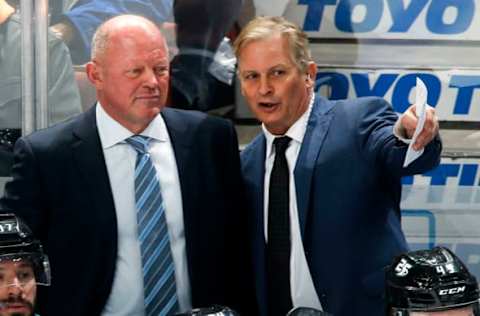 ANAHEIM, CA – FEBRUARY 13: Interim head coach of the Anaheim Ducks, Bob Murray, chats with assistant coach, Mark Morrison while coaching first NHL game on February 13, 2019, against the Vancouver Canucks at Honda Center in Anaheim, California. (Photo by Debora Robinson/NHLI via Getty Images)