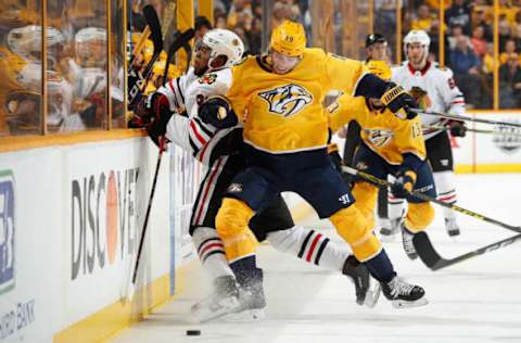 NASHVILLE, TN – JANUARY 30: Calle Jarnkrok #19 of the Nashville Predators checks Anthony Duclair #91 of the Chicago Blackhawks during an NHL game at Bridgestone Arena on January 30, 2018 in Nashville, Tennessee. (Photo by John Russell/NHLI via Getty Images)