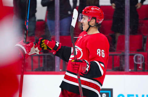 Apr 29, 2021; Raleigh, North Carolina, USA; Carolina Hurricanes left wing Teuvo Teravainen (86) celebrates his third period goal against the Detroit Red Wings at PNC Arena. Mandatory Credit: James Guillory-USA TODAY Sports