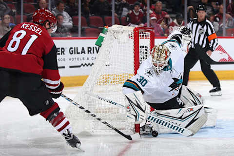 GLENDALE, ARIZONA – JANUARY 14: Goaltender Aaron Dell #30 of the San Jose Sharks makes a save on the puck as Phil Kessel #81 of the Arizona Coyotes attempts a rebound during the first period of the NHL game at Gila River Arena on January 14, 2020 in Glendale, Arizona. (Photo by Christian Petersen/Getty Images)