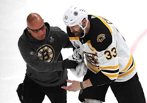 ST. LOUIS, MO – JUNE 3: Boston Bruins’ Zdeno Chara is helped off the ice after an injury in the second period. The St. Louis Blues host the Boston Bruins in Game 4 of the 2019 Stanley Cup Finals at the Enterprise Center in St. Louis, MO on June 3, 2019. (Photo by John Tlumacki/The Boston Globe via Getty Images)