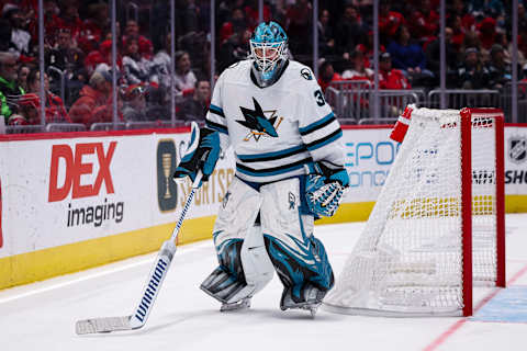 WASHINGTON, DC – FEBRUARY 12: Aaron Dell #30 of the San Jose Sharks handles the puck behind the net during the second period of the game against the Washington Capitals at Capital One Arena on February 12, 2023 in Washington, DC. (Photo by Scott Taetsch/Getty Images)