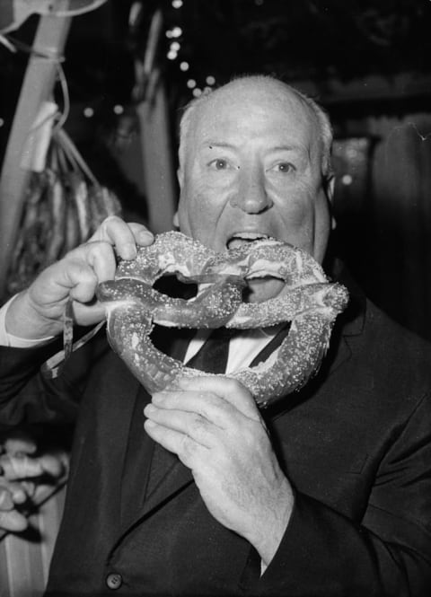 Alfred Hitchcock attends the premiere of Psycho (1960).