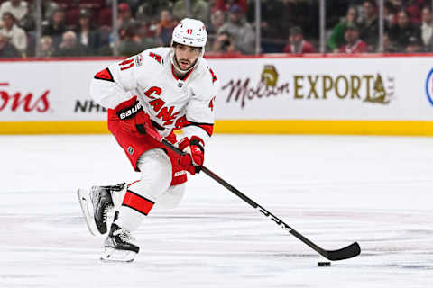 Apr 1, 2023; Montreal, Quebec, CAN; Carolina Hurricanes defenseman Shayne Gostisbehere (41) plays the puck against the Montreal Canadiens during the second period at Bell Centre. Mandatory Credit: David Kirouac-USA TODAY Sports