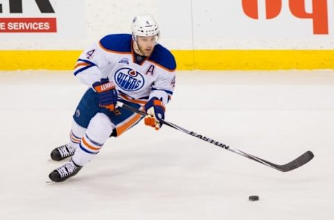 Mar 10, 2016; Saint Paul, MN, USA; Edmonton Oilers forward Taylor Hall (4) skates with the puck in third period against the Minnesota Wild at Xcel Energy Center. The Edmonton Oilers bet the Minnesota Wild 2-1. Mandatory Credit: Brad Rempel-USA TODAY Sports