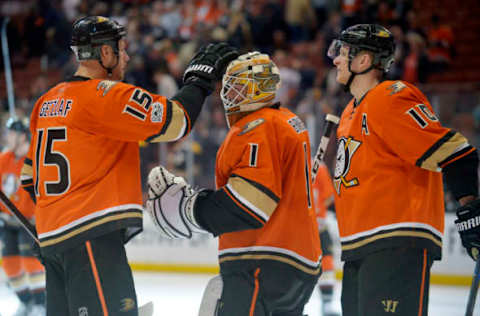 February 22, 2017; Anaheim, CA, USA; Anaheim Ducks center Ryan Getzlaf (15), goalie Jonathan Bernier (1) and right wing Corey Perry (10) celebrate the 5-3 victory against the Boston Bruins at Honda Center. Mandatory Credit: Gary A. Vasquez-USA TODAY Sports