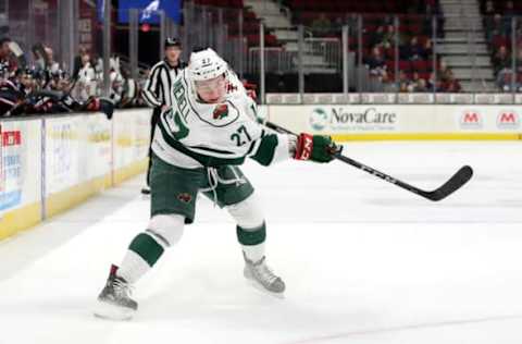 CLEVELAND, OH – JANUARY 25: Iowa Wild defenceman Brennan Menell (27) shoots the puck during the first period of the American Hockey League game between the Iowa Wild and Cleveland Monsters on January 25, 2018, at Quicken Loans Arena in Cleveland, OH. Iowa defeated Cleveland 4-3 in overtime. (Photo by Frank Jansky/Icon Sportswire via Getty Images)