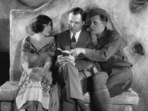 The Big Parade stars Renee Adoree and John Gilbert working with director King Vidor.