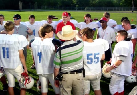 Tracy Goode and Alex Kendrick in Facing the Giants (2006).