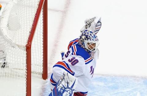 Henrik Lundqvist #30 of the New York Rangers tends net during the third period against the Carolina Hurricanes (Photo by Andre Ringuette/Getty Images)