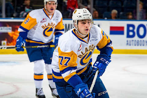 KELOWNA, BC – DECEMBER 01: Kirby Dach #77 of the Saskatoon Blades skates against the Kelowna Rockets at Prospera Place on December 1, 2018 in Kelowna, Canada. (Photo by Marissa Baecker/Getty Images)