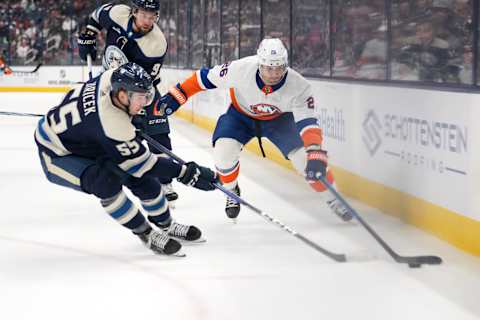 COLUMBUS, OHIO – OCTOBER 28: Oliver Wahlstrom #26 of the New York Islanders (R) skates with the puck against David Jiricek #55 of the Columbus Blue Jackets during the first period at Nationwide Arena on October 28, 2023 in Columbus, Ohio. (Photo by Jason Mowry/Getty Images)