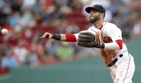 Aug 31, 2016; Boston, MA, USA; Boston Red Sox second baseman Dustin Pedroia (15) makes a throw to first base against the Tampa Bay Rays during the eighth inning at Fenway Park. Mandatory Credit: Greg M. Cooper-USA TODAY Sports