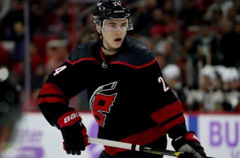 RALEIGH, NC – NOVEMBER 30: Jake Bean #24 of the Carolina Hurricanes skates for position on the ice during an NHL game against the Anaheim Ducks on November 30, 2018, at PNC Arena in Raleigh, North Carolina. (Photo by Gregg Forwerck/NHLI via Getty Images)