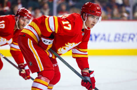 Sep 29, 2023; Calgary, Alberta, CAN; Calgary Flames left wing Yegor Sharangovich (17) during the face off against the Edmonton Oilers during the first period at Scotiabank Saddledome. Mandatory Credit: Sergei Belski-USA TODAY Sports