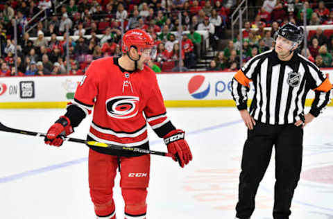 RALEIGH, NORTH CAROLINA – FEBRUARY 25: Justin Williams #14 of the Carolina Hurricanes has words for the official during the second period of a game against the Dallas Stars at PNC Arena on February 25, 2020 in Raleigh, North Carolina. (Photo by Grant Halverson/Getty Images)