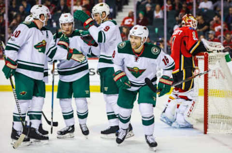 Vegas Golden Knights: Minnesota Wild left wing Jason Zucker (16) celebrates his goal with teammates against the Calgary Flames during the second period at Scotiabank Saddledome. Mandatory Credit: Sergei Belski-USA TODAY Sports