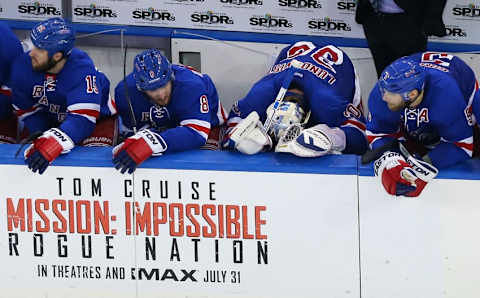 May 29, 2015; New York, NY, USA; New York Rangers goalie Henrik Lundqvist (30) reacts on the bench with teammates Tanner Glass (15) , Kevin Klein (8) and Dan Girardi (5) as the Rangers play with an empty net against the Tampa Bay Lightning during the third period in game seven of the Eastern Conference Final of the 2015 Stanley Cup Playoffs at Madison Square Garden. Mandatory Credit: Adam Hunger-USA TODAY Sports