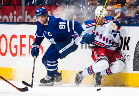 TORONTO, ON – DECEMBER 28: John Tavares #91 of the Toronto Maple Leafs skates against Pavel Buchnevich #89 of the New York Rangers during the third period at the Scotiabank Arena on December 28, 2019 in Toronto, Ontario, Canada. (Photo by Mark Blinch/NHLI via Getty Images)