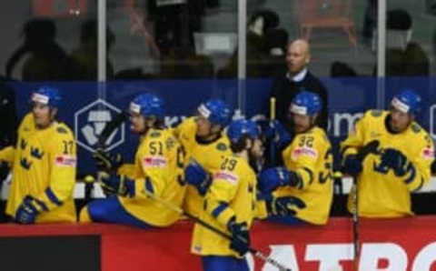 Sweden’s forward Mario Kempe celebrates with team mates scoring the 3-1 vie during the IIHF Men’s Ice Hockey World Championships preliminary round group A match between Sweden and Great Britain, at the Olympic Sports Center in Riga, on May 28, 2021. (Photo by Gints IVUSKANS / AFP) (Photo by GINTS IVUSKANS/AFP via Getty Images)