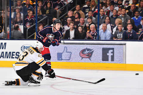 COLUMBUS, OH – OCTOBER 13: Zach Werenski #8 of the Columbus Blue Jackets shoots the puck past Brad Marchand #63 of the Boston Bruins during the first period of a game on October 13, 2016 at Nationwide Arena in Columbus, Ohio. (Photo by Jamie Sabau/NHLI via Getty Images)